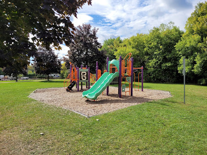 Orange and green playground structure in Two Rivers, Guelph, Ontario
